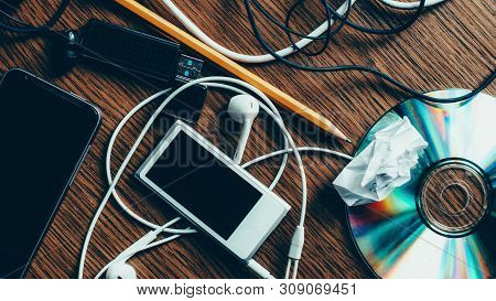 Modern Lifestyle. Technology And Progress. Desk Chaos. Top View Of Electronic Stuff.