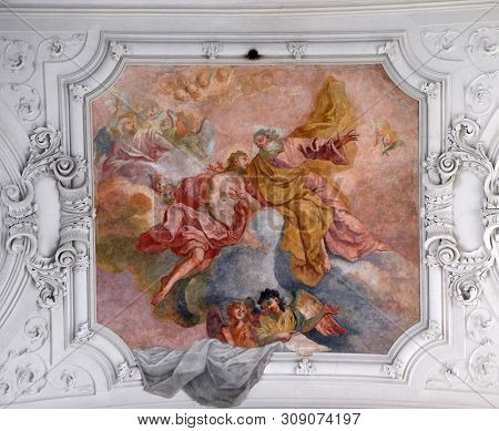 WURZBURG, GERMANY - JULY O4, 2018: Jesus returns to His Father in heaven, fresco in Neumunster Collegiate Church in Wurzburg, Germany
