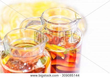 Two Pither Jugs With Traditional British Summer Pimms Cocktail Punch With Lemonade, Strawberries, Cu