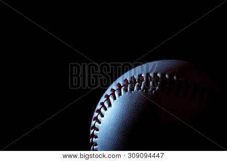 One Of The Baseball With A Dark Background