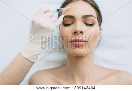 Dysport Injections In Forehead Wrinkles, Blocking Mimic Wrinkles Using Beauty Injections At Beauty C