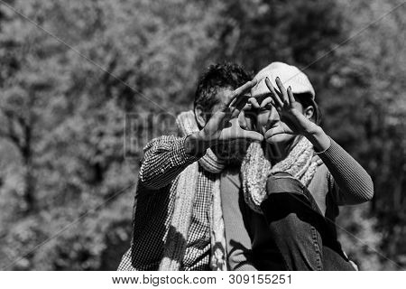 Dating And Autumn Love Concept. Man And Woman Show Heart
