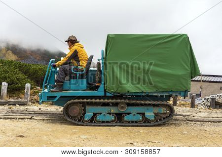 Tateyama, Japan - October 3, 2018. A Man Is Driving The Land Rover. Cross Country All Terrain Vehicl