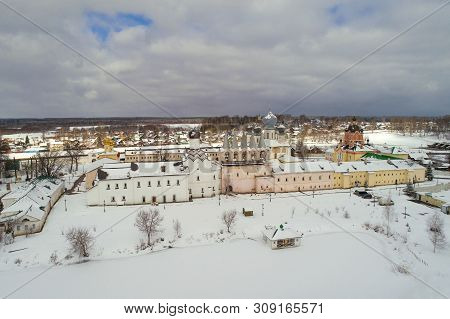 A Cloudy March Day Over The Old Tikhvin Assumption Monastery (aerial Photography). Leningrad Region,