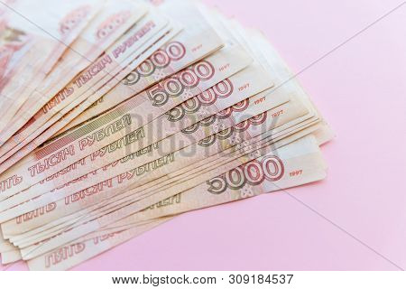 Russian Rubles Isolated On Pink, Packed Stack Of Banknotes.russian Money 5000 Rubles Banknote Closeu