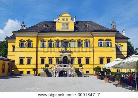 Salzburg, Austria - May 25, 2019 : Main Facade Of Hellbrunn Palace (schloss Hellbrunn), Summer Resid