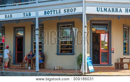 Ulmarra Australia - February 10 2012; People Relaxing And Socializing Under Shady Porch Around Histo