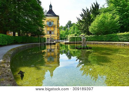 Salzburg, Austria - May 25, 2019 : Sculptures At The Pond In Public Gardens Of Hellbrunn Palace (sch