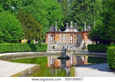 Salzburg, Austria - May 25, 2019 : Sculptures At The Pond In Public Gardens Of Hellbrunn Palace (sch