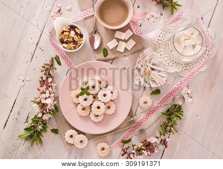 Canestrelli Biscuits With Icign Sugar On Wooden Table.
