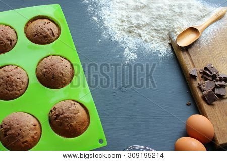 Homemade Muffins With Chocolate. Ingredients For Baking. Copy Space.