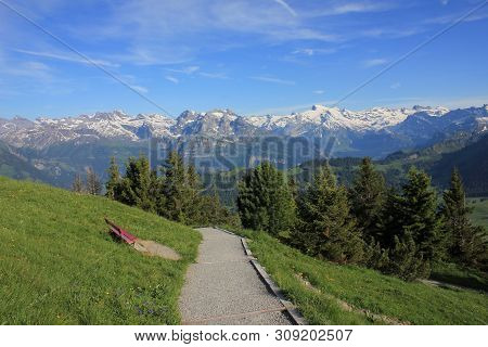 Mount Titlis And Other High Mountains Seen From Mount Stanserhorn, Switzerland.