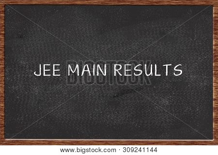 Jee Main Results Written On Black Chalk Board.