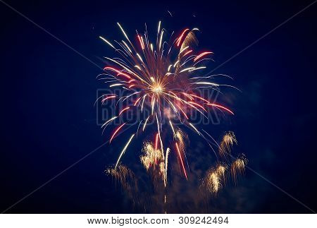 Festive Salute Against The Night Sky Of Red-yellow Color For Any Purpose