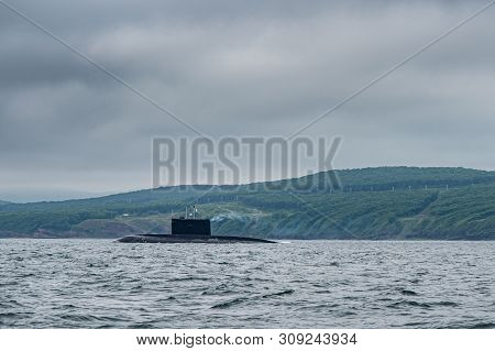 A Line Of Modern Russian Military Submarine Cruisers In The Row, Northern Fleet And Baltic Sea Fleet