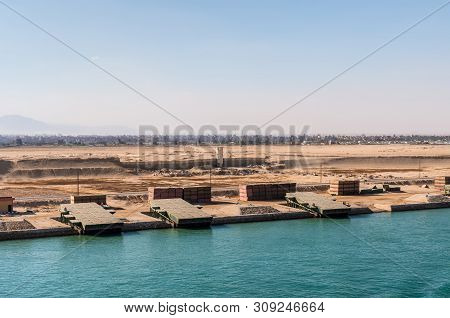 Suez, Egypt - November 5, 2017: Pontoons Bridge For Crossing The Suez Canal Lie On The Shore Of Cana