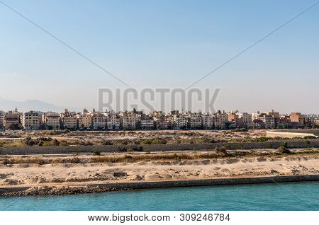 Suez, Egypt - November 5, 2017: Residential Buildings On The Shore Of Suez Canal In Egypt, Africa.