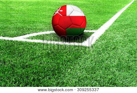 Soccer Ball On A Green Field, Flag Of Oman