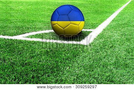 Soccer Ball On A Green Field, Flag Of Ukraine