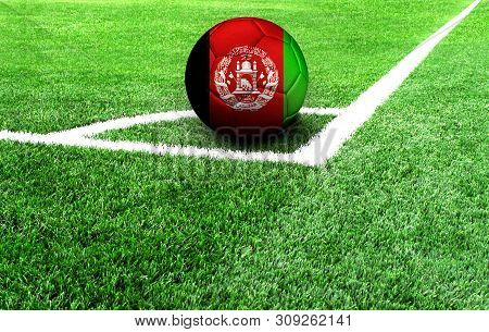 Soccer Ball On A Green Field, Flag Of Afghanistan