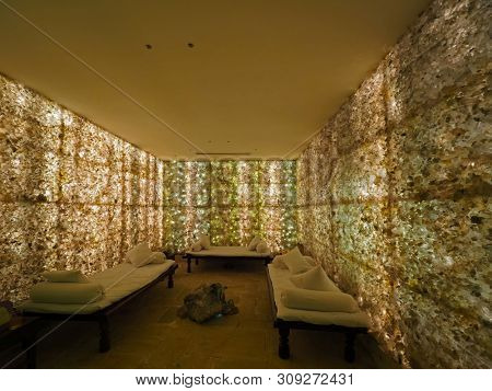 DHULIKHEL, NEPAL - JANUARY 2019 : Room and wall full of back-lit Himalayan Rock Crystal to practice meditation inside Crystal House at Dwarikaâs Resort on January 7, 2019 in Dhulikhel, Nepal 