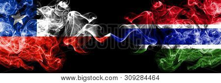 Chile Vs Gambia, Gambian Smoky Mystic Flags Placed Side By Side. Thick Colored Silky Smokes Combinat