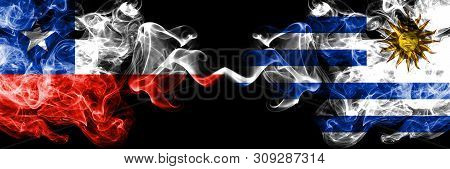 Chile Vs Uruguay, Uruguayan Smoky Mystic Flags Placed Side By Side. Thick Colored Silky Smokes Combi