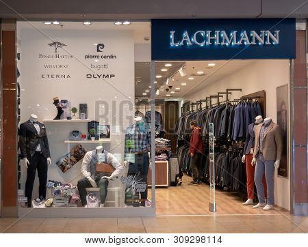 Gyor Hungary 05 07 2019 A Young Buyer Looking For Clothes In A Lachmann Shop