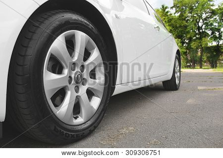 Kiev, Ukraine - July 2, 2018: White Opel Insignia, View Of The Car From The Bottom. Car Wheels Close