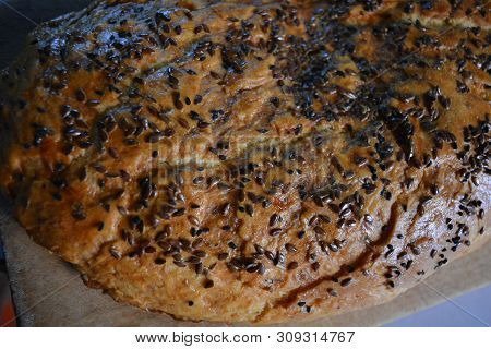 Beautiful Very Hearty Bread Homemade Recipe. Brown Bread With Crispy Crust, Black Caraway Seeds And 