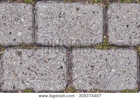 Abstract Seamless Texture For Designers With Stone Pavement. There Are Green Grass Between Blocks. S