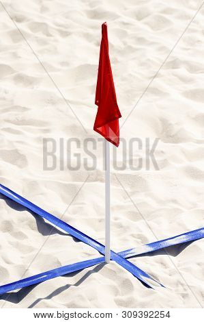 Beach Soccer Court Up Close And In Detail With Blue Plastic Line Marker And Red Flag
