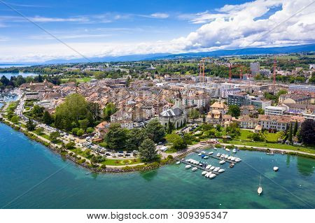 Aerial View Of Morges City Waterfront In The Border Of The Leman Lake In  Switzerland
