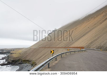 Road Through The Hvalnesskridur Land Slides In East Iceland On A Foggy Day