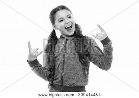 I Am Going Rock This Party. Kid Shouting With Crazy Expression Doing Rock Symbol Hands Up. Music Sta