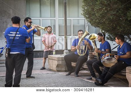 Pancevo, Serbia - August 1, 2015: Roma Music Band Rehearsing Before A Wedding Performance In The Sub