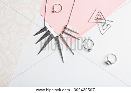 Set Of Elegant Jewelry On Color Background