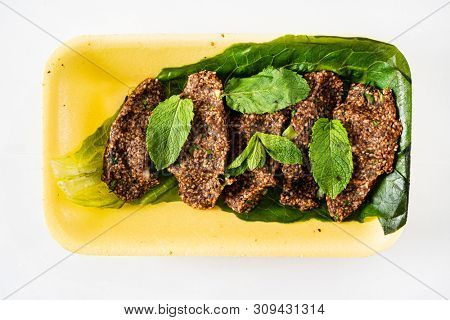 traditional Turkish cutlets (Ãi? kÃ¶fte) 