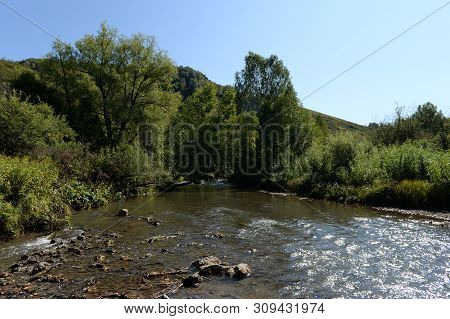 The Mountain River Yarovka On The Territory Of The Altai Territory In Western Siberia. Russia