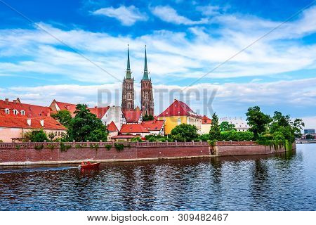Wroclaw, Poland Panorama Of Ostrow Tumski Island, Odra Or Oder River And Cathedral Towers