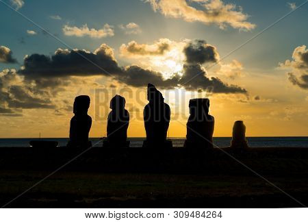 Silhuette Of Ahu Vai Uri In The Archaeological Site Of Tahai On Easter Island At Sunset