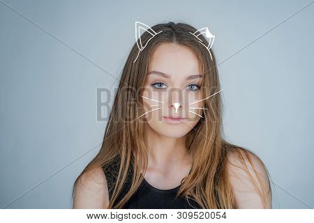 Kitty, Cat. Woman Portrait Natural Beautiful. Portrait Of A Beautiful Girl In Studio. Posing For Uni