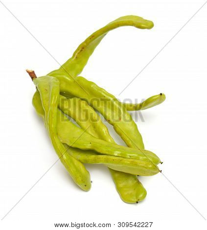Green Carob Pods. Isolated On White Background