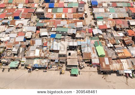 Streets Of Poor Areas In Manila. The Roofs Of Houses And The Life Of People In The Big City. Poor Di