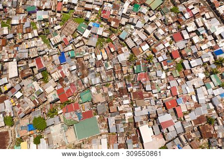 Streets Of Poor Areas In Manila. The Roofs Of Houses And The Life Of People In The Big City. Poor Di