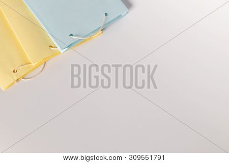 Colorfull Empty Paper Shopping Bag On Isolated Background.
