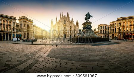 Milan Piazza Del Duomo Square. City Center Illuminated In The Sunrise. Milano, Italy