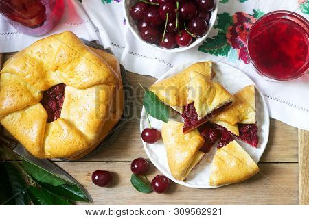 Traditional Homemade Romanian And Moldovan Pies - Placinta, Served With Wine. Rustic Style.