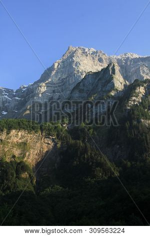 High Mountain In Glarus Canton, Switzerland. Mount Glaernisch Seen From Lake Kloental.