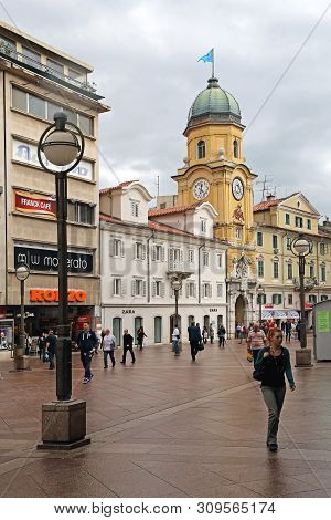 Rijeka, Croatia - October 17, 2014: Clock Tower And City Gate Landmark At Korzo Pedestrian Street In